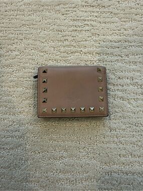 Valentino Rockstud compact wallet powder pink gold studs $520